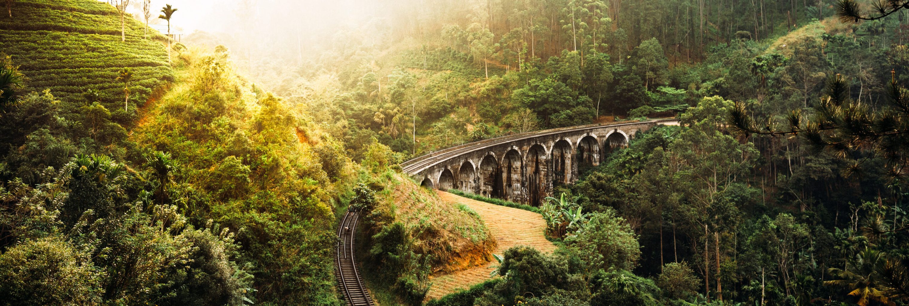 Nine-arch bridge in Sri Lanka. Beautiful railway bridge in Asia. Nature of Sri Lanka. Tea plantations in Asia. Colonial architecture